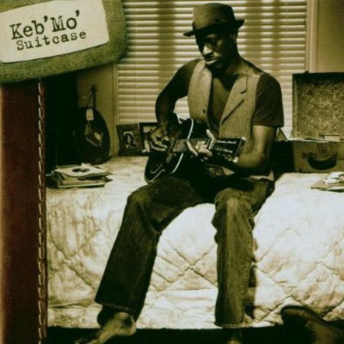 the album cover for Keb' Mo' - Suitcase