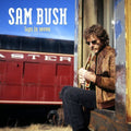 the album cover for Sam Bush - Laps in Seven