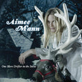 the album cover for Aimee Mann - One More Drifter in the Snow