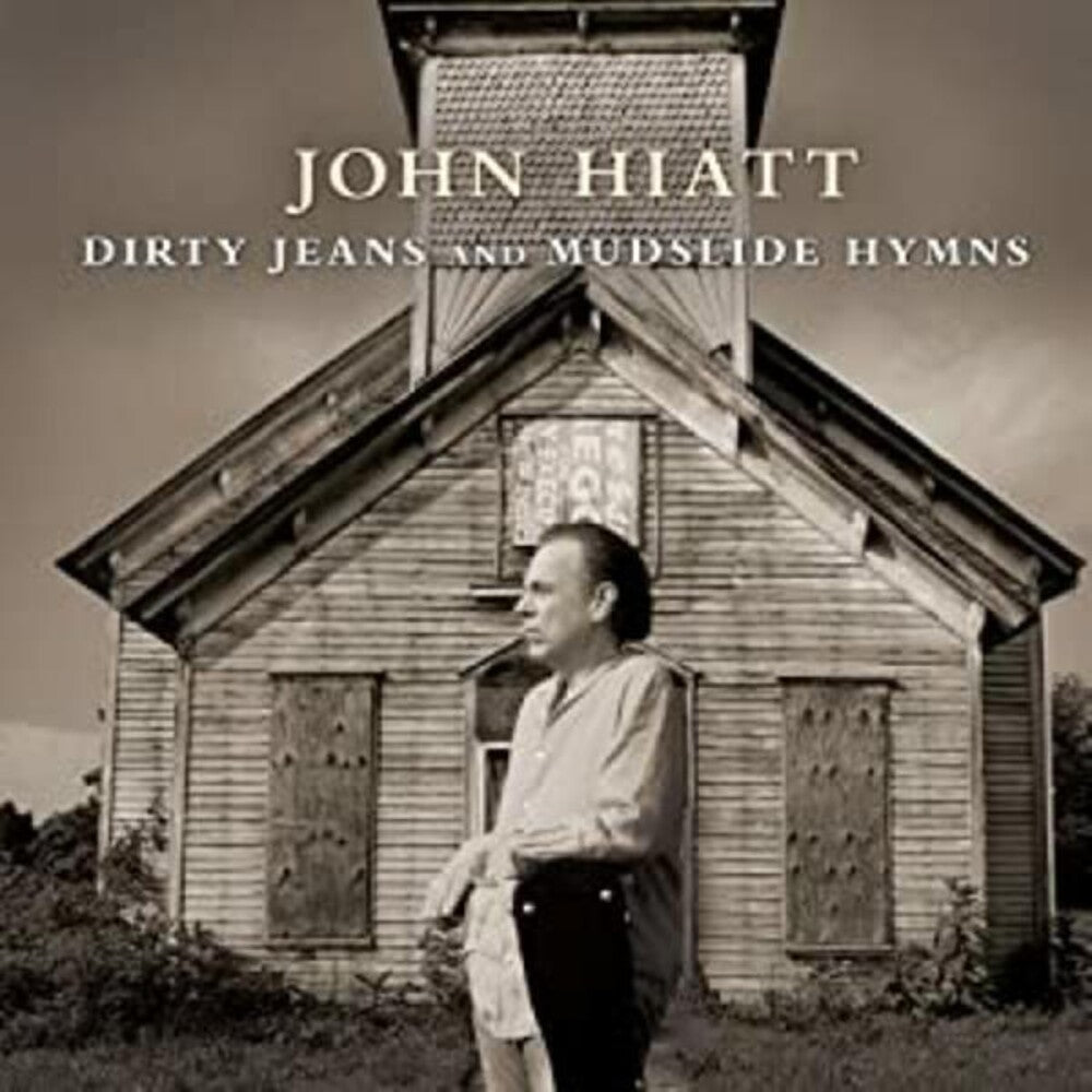 the album cover for John Hiatt - Dirty Jeans & Mudslide Hymns (W/Dvd) [Deluxe]