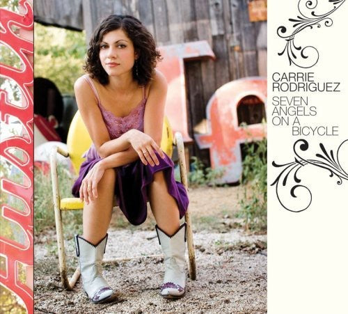 the album cover for Carrie Rodriguez - Seven Angels on a Bicycle